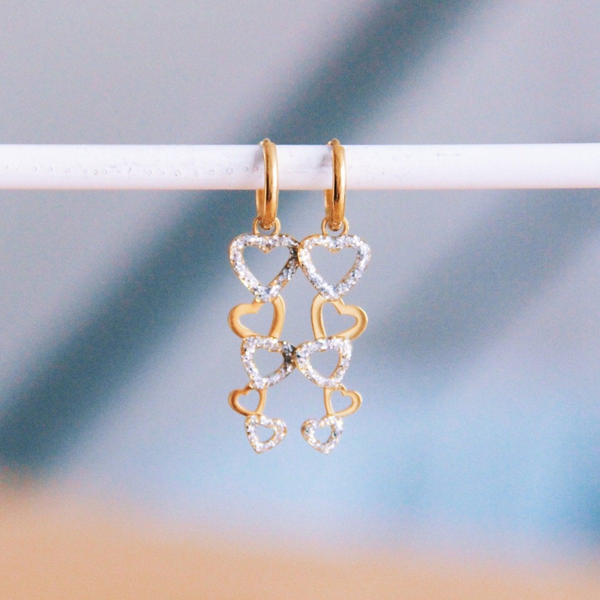 Stainless steel earrings with glitter hearts