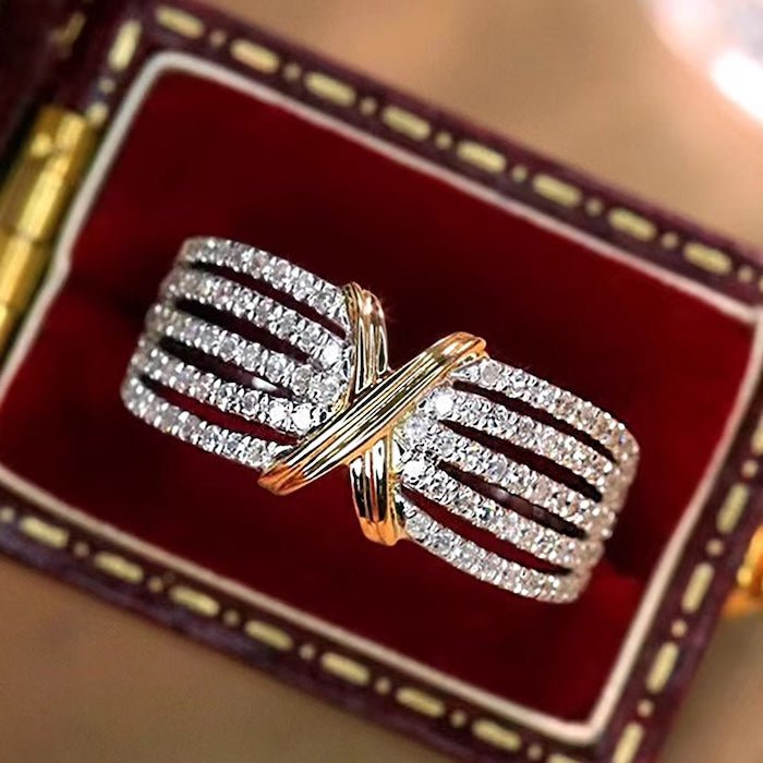 Luxurious cross-line eternity ring