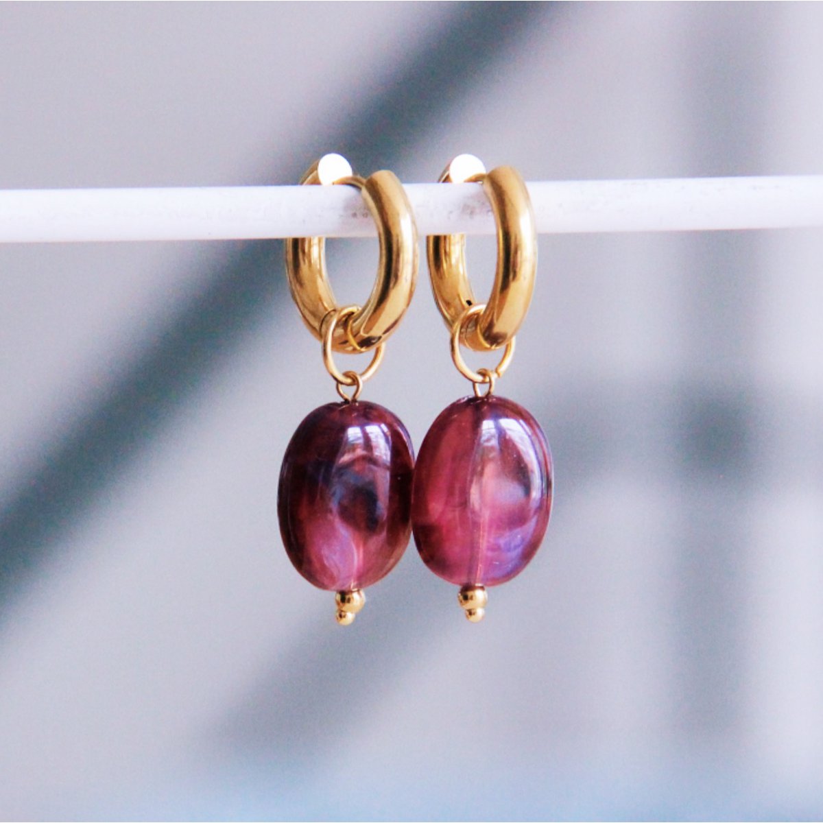 Wide hoop with oval resin pendant - purple