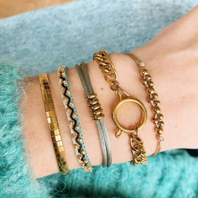 Velora platte armband gestreept - goud